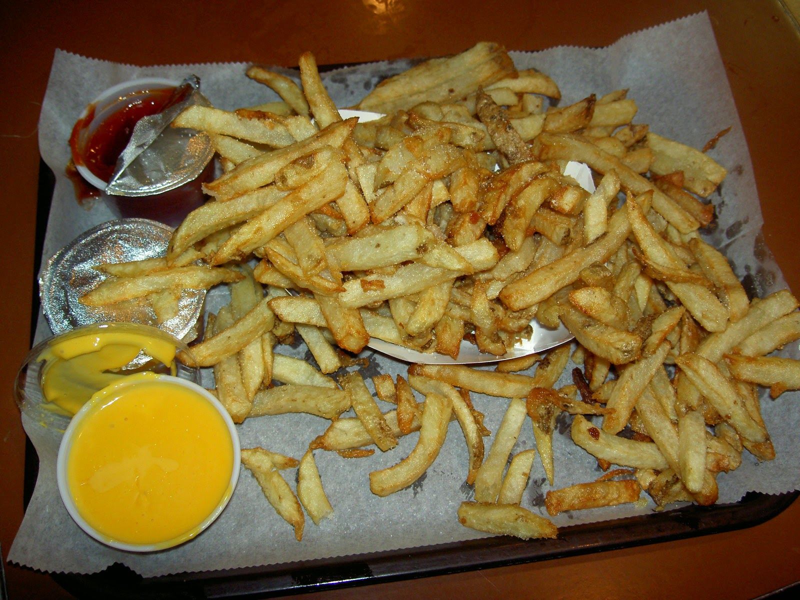 A tray of french fries from The Original Hot Dog Shop.